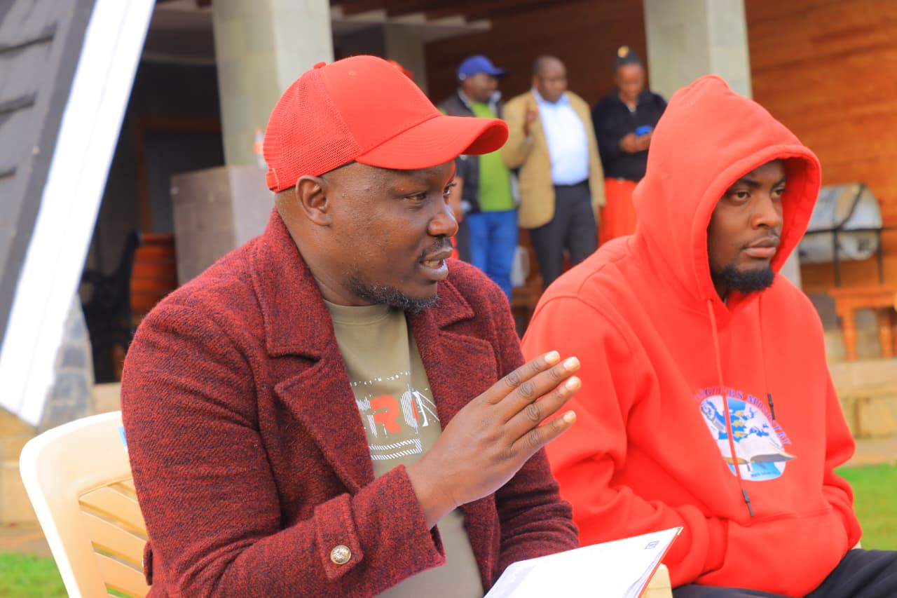 Dr. Birundu in discussion with campaign team